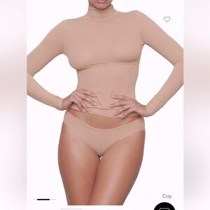 SKIMS long sleeve mock neck top in nude